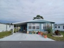 Come settle down in a beautiful manufactured home with about 1 for sale in Orlando Florida Orange County County on GolfHomes.com