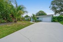 CBS-built home situated on a prime corner lot, offers the for sale in Tequesta Florida Palm Beach County County on GolfHomes.com
