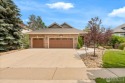 Discover elevated living in this impeccably maintained for sale in Loveland Colorado Larimer County County on GolfHomes.com