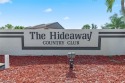 Nestled within the prestigious Hideaway Country Club, this for sale in Fort Myers Florida Lee County County on GolfHomes.com