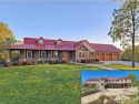 Immaculate custom home on 6.7 private acres w/mature trees & for sale in Springfield Ohio Clark County County on GolfHomes.com