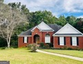 Elegant Four-Sided Brick Ranch in The Providence Club, an for sale in Monroe Georgia Walton County County on GolfHomes.com