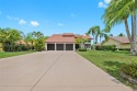 Located on nearly half an acre of prime golf course frontage for sale in Tamarac Florida Broward County County on GolfHomes.com
