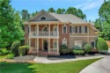 Prepare to be impressed by this stunning colonial-style home for sale in Dacula Georgia Gwinnett County County on GolfHomes.com