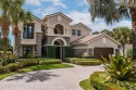 Welcome to your dream home in the prestigious Jupiter Country for sale in Jupiter Florida Palm Beach County County on GolfHomes.com