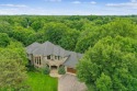 Tucked at the very back of Bearpath on one of the most private for sale in Eden Prairie Minnesota Hennepin County County on GolfHomes.com