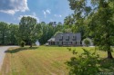 Enjoy main lake views and water-access living from this cape cod for sale in Bracey Virginia Mecklenburg County County on GolfHomes.com