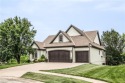 DID SOMEONE SAY VIEW?!-This Gorgeous 1 1/2 Story is located on a for sale in Lenexa Kansas Johnson County County on GolfHomes.com