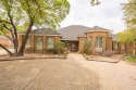 This spacious home is located in a desirable neighborhood for sale in Odessa Texas Midland County County on GolfHomes.com