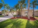 PREMIUM LAKEFRONT LOCATION - A tropical OASIS in Willoughby for sale in Stuart Florida Martin County County on GolfHomes.com