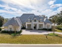 Indulge in luxury living from this impeccable new construction for sale in Ocala Florida Marion County County on GolfHomes.com