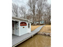 Discover unparalleled lakefront living in the coveted Tanglewood for sale in Bracey Virginia Mecklenburg County County on GolfHomes.com