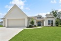 Elegant new construction in the highly sought-after Money Hill for sale in Abita Springs Louisiana St. Tammany Parish County on GolfHomes.com