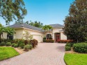 Located on a quiet cut-de-sac in the highly desirable Pelican for sale in Venice Florida Sarasota County County on GolfHomes.com