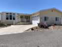 Adult Active 55+ Inspire Community, on leased land. This triple for sale in Cottonwood Arizona Yavapai County County on GolfHomes.com