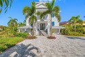 Welcome to this exceptional elevated Key West style 4-bedroom for sale in St. Petersburg Florida Pinellas County County on GolfHomes.com