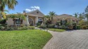 Presenting a spectacular Spanish Mediterranean Style-inspired for sale in University Park Florida Manatee County County on GolfHomes.com