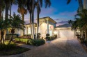 Nestled in the exclusive Isles at Hunters Run Country Club, this for sale in Boynton Beach Florida Palm Beach County County on GolfHomes.com