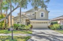 Welcome to a beautifully updated home that blends modern for sale in Winter Garden Florida Orange County County on GolfHomes.com