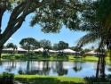 Gorgeous Panoramic Lake Views!  Enter the 24 hr manned gated for sale in Palm City Florida Martin County County on GolfHomes.com