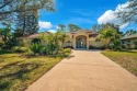 Indulge in unparalleled views of the tranquil lake and verdant for sale in Nokomis Florida Sarasota County County on GolfHomes.com
