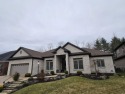 This beautiful 4 bedroom home, in The Enclave at Woodfield for sale in Newburgh Indiana Warrick County County on GolfHomes.com