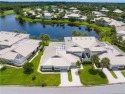 This lakeside end unit single story Foxcross is delightful in for sale in Stuart Florida Martin County County on GolfHomes.com