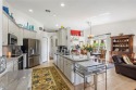 Motivated Seller invites you to make this charming coach home for sale in Naples Florida Collier County County on GolfHomes.com