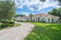 Experience luxury living in this stunning, modern estate for sale in Windermere Florida Orange County County on GolfHomes.com