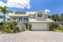 This exquisite residence boasts a timeless design & meticulous for sale in Sanibel Florida Lee County County on GolfHomes.com