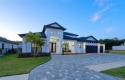 Experience the epitome of luxury living in this stunning smart for sale in Odessa Florida Hillsborough County County on GolfHomes.com