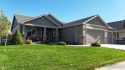 Experience the best of both worlds: watch golfers tee off across for sale in Windsor Colorado Larimer County County on GolfHomes.com