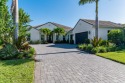 Magnificent four-bedroom, 4.5-bath home plus den, boasts a for sale in Naples Florida Collier County County on GolfHomes.com