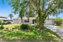 This stunning Renovated home IS STURDY AS STEEL AND NOTHING TO for sale in Port Charlotte Florida Charlotte County County on GolfHomes.com