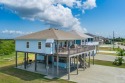 This Beautiful Custom Beach Home is located in the very for sale in Port Bolivar Texas Galveston County County on GolfHomes.com