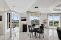 Spectacular golf, lake & tropical garden views from your wrap for sale in Lake Worth Florida Palm Beach County County on GolfHomes.com