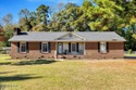 This isn't your average brick ranch - it's a beautifully for sale in Kinston North Carolina Lenoir County County on GolfHomes.com