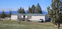 Nestled beneath the gaze of majestic Mt. Shasta, this charming for sale in Montague California Siskiyou County County on GolfHomes.com