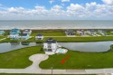 Discover this captivating lot with picturesque views overlooking for sale in Port Bolivar Texas Galveston County County on GolfHomes.com