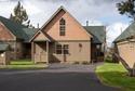 This charming chalet-style home offers a perfect blend of rustic for sale in Redmond Oregon Deschutes County County on GolfHomes.com