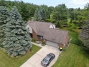 Located in highly desirable subdivision along the golf course, a for sale in Alpena Michigan Alpena County County on GolfHomes.com