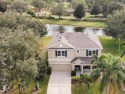 Gorgeous Waterfront Home in Gated Community Near Lake Nona! This for sale in Orlando Florida Orange County County on GolfHomes.com