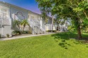 One or more photo(s) has been virtually staged. Nestled on the for sale in Bradenton Florida Manatee County County on GolfHomes.com