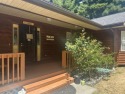 Enchanting 3 bedroom, 2 1/2 bath home, nestled on a one acre for sale in Crescent City California Del Norte County County on GolfHomes.com