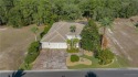 This exceptional home, built by Arthur Rutenberg, offers the for sale in Dunnellon Florida Marion County County on GolfHomes.com