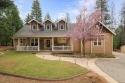 Let the custom stamped driveway lead you to the composited front for sale in Lake Almanor California Plumas County County on GolfHomes.com