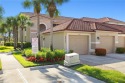 Seldom available 2nd Floor corner unit with garage in Cypress for sale in Naples Florida Collier County County on GolfHomes.com