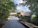 This beautiful 5BDRM/3FB/2HB Country-Traditional home enjoys an for sale in Big Canoe Georgia Pickens County County on GolfHomes.com