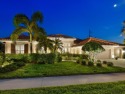 Extraordinary lake front estate home! Entering through the for sale in Venice Florida Sarasota County County on GolfHomes.com