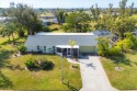 DOUBLE LOT Pool home on the Rotonda Golf & Country Club's 13th for sale in Rotonda West Florida Charlotte County County on GolfHomes.com